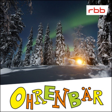 Eine beleuchtete Hütte im Winterwald, darüber Polarlichter (Quelle: imago/Frank Sorge)