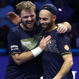 Kevin Krawietz und Tim Pütz bejubeln den Sieg bei den ATP Finals