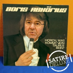 Alte Schlager-LP mit Boris Pistorius auf dem Cover. Titel: "Boris Abhörius - Horch, was kommt von Taurus rein"