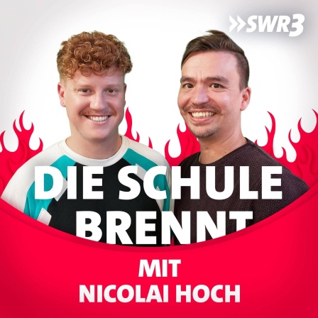 Nicolai Hoch und Bob Blume vor Flammen