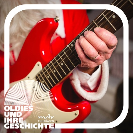 Weihnachtsmann spielt auf Gitarre