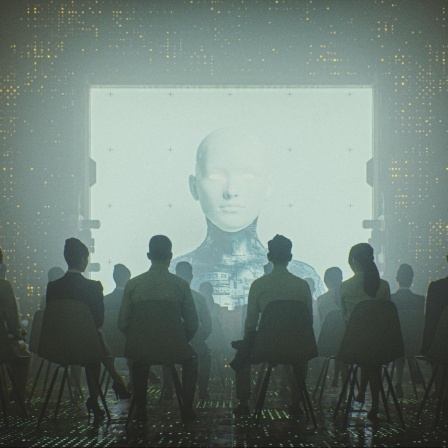 Ein 3D-generiertes Bild mit der Darstellung einer Künstlichen Intelligenz, die vor einer sitzenden Personengruppe auf einen Bildschirm projeziert wird.