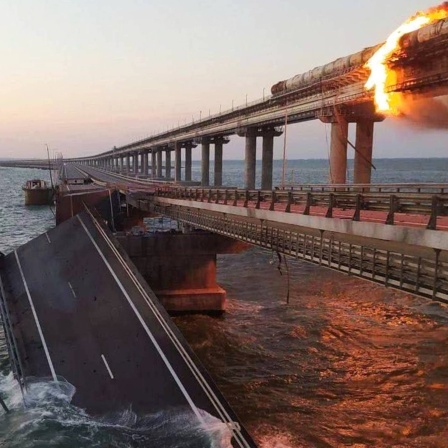 OCTOBER 8, 2022. Collapsed section of a bridge linking Crimea to mainland Russia.