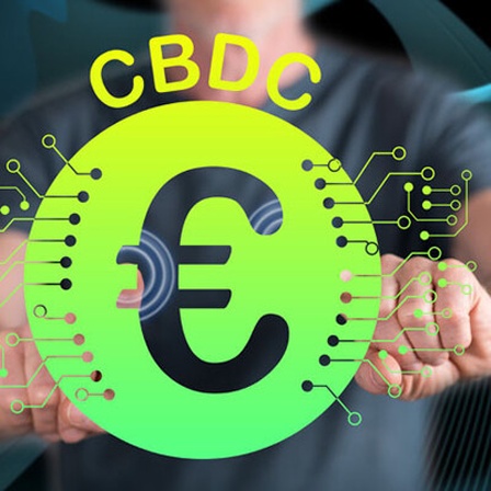 Man touching a cbdc (central bank digital currency) Euro concept on a touch screen with his fingers