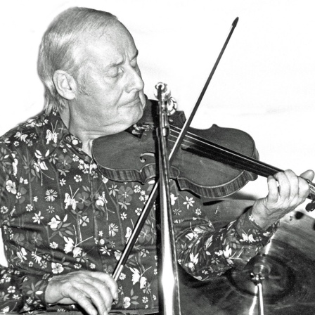 Stéphane Grappelli spielt Geige.