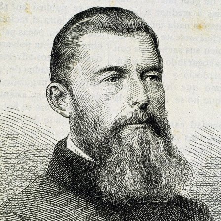 Ein Stich zeigt Ludwig Feuerbach mit ernstem Blick und rauschendem Vollbart, sein Kopfhaar ist aus der Stirn nach hinten gekämmt