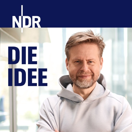 Neben Norbert Grundei wird der Schriftzug "Die Idee" gezeigt.