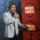 Manfred Sexauer - der deutsche Hoerfunk- und Fernsehmoderator bei einem TV-Auftritt in der Sendung Musikladen in den 80er Jahren.