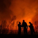 RUSSIA, TYUMEN REGION - MAY 7, 2023: Firefighters battle a wildfire near the Druzhba dacha community. The Tyumen Region has declared a state of emergency. Partial evacuation is underway in the most affected areas.