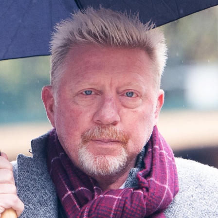 Boris Becker unter Schirm vor Gericht