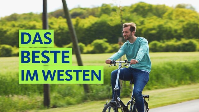 Daniel Assmann auf dem Fahrrad und Schriftzug "Das Beste im Westen"