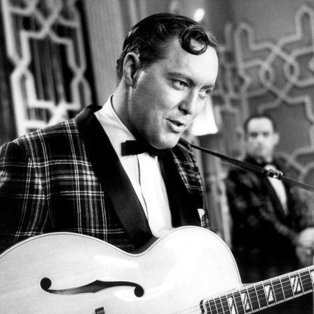 Bill Haley mit Gitarre 1956