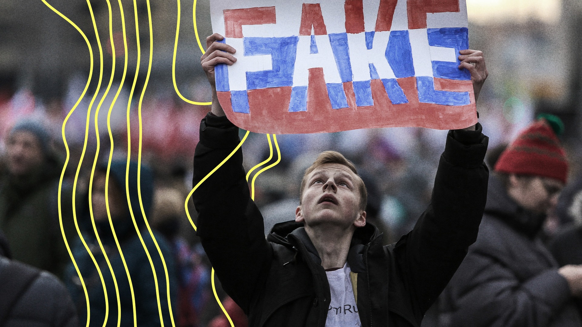 Ein Demonstrant hält, während einer Demonstration, ein Plakat mit der Aufschrift "FAKE" in der Hand. Teilnehmer einer Oppositionskundgebung im Zentrum von Moskau protestierten gegen die Verschärfung der staatlichen Kontrolle über das Internet in Russland.