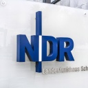 NDR Logo (Norddeutscher Rundfunk) in Grossbuchastaben an der Fassade des Landesfunkhauses in Kiel 