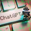 Eine Fotomontage von einem Miniatur-Roboter auf einer Computertaste mit der Aufschrift ChatGPT.