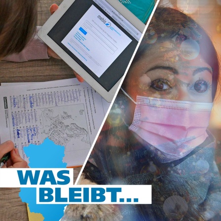 Eine junge Frau mit Nasen-Mundschutz vor einem geschmückten Weihnachtsbaum.