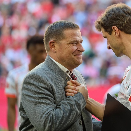 Max Eberl mit Thomas Müller