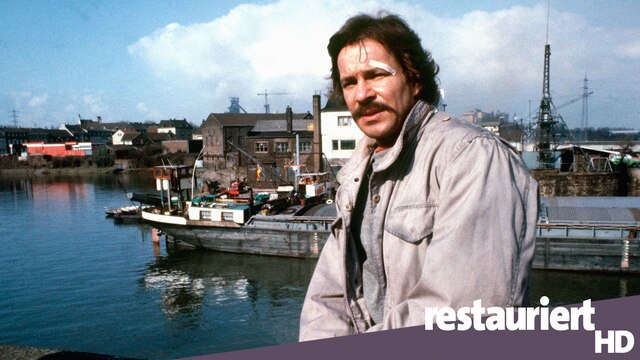 Götz George in seiner Rolle als "Tatort"-Kommissar Schimanski bei Dreharbeiten im Duisburger Hafen 1981
