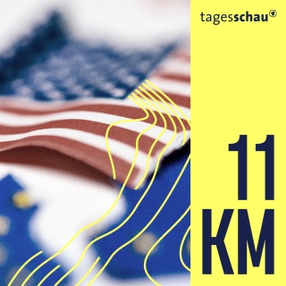 Zwei Flaggen, Europa und USA, stehen nebeneinander