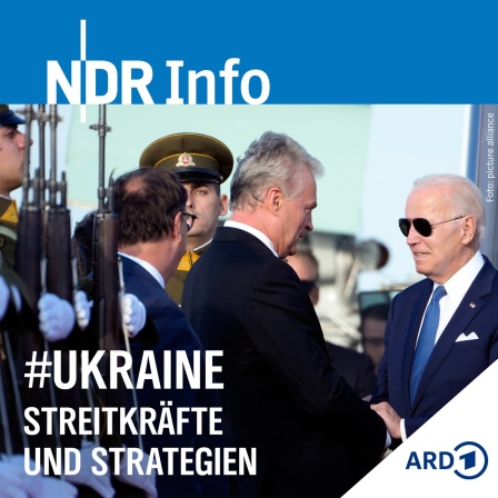 Präsident Biden wird von Litauens Präsident bei seiner Ankunft zum NATO-Gipfel am Flughafen Vilnius begrüßt.