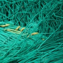 Symbolbild: Struktur eines grünen Fischernetzes