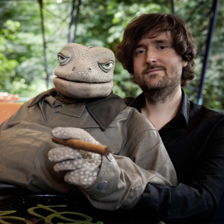 Michael Hatzius mit Echse