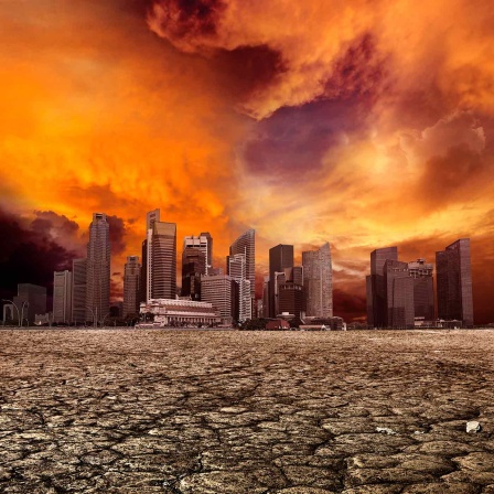 Ausgetrocknete Erde, eine zerstörte Stadt und darüber ein roter Himmel. 