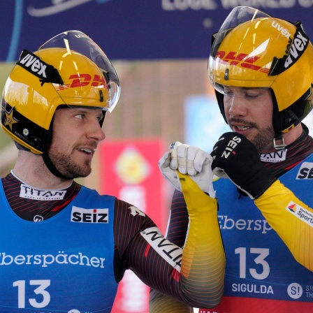 Tobias Wendl und Tobias Arlt aus Deutschland reagieren nach ihrem zweiten Platz