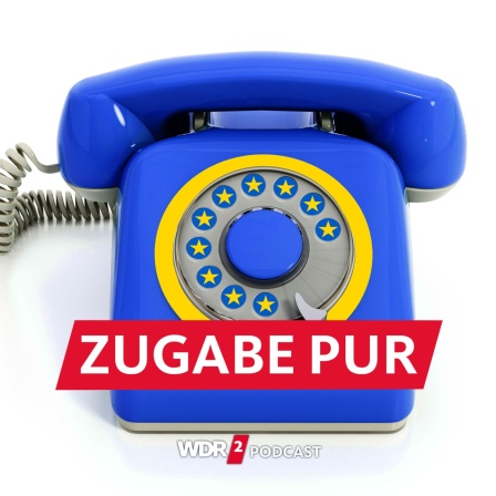 Satirische Fotomontage: Ein altes Wählscheiben-Telefon in den Farben der EU mit gelben Sternen statt Ziffern