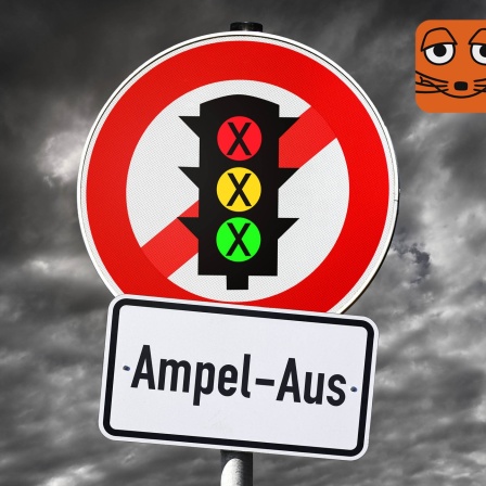 Ein zusammengebautes Verkehrsschild mit einer durchgestrichenen Ampel