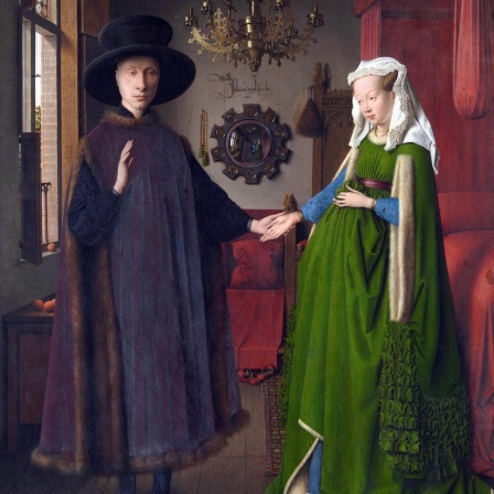 Gemälde mit dem Titel „Das Arnolfini-Porträt“, 1434 gemalt von Jan van Eyck (1390-1441). Das berühmte Gemälde ist auch bekannt als „Die Arnolfini-Hochzeit“, National Gallery London.