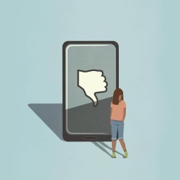 Illustration: Zu sehen ist ein trauriges Mädchen, das vor einem großen Smartphone Bildschirm mit einem Daumen-nach-unten-Symbol steht.