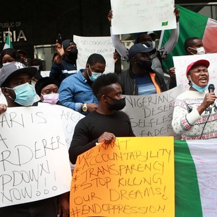 Nigerian Americans and New Yorkers attend the March for Nigerian Lives in solidarity with protests against police brutality and corruption in the City of Lagos in Nigeria, Africa where peaceful protests have resulted in the killings of several demonstrato
