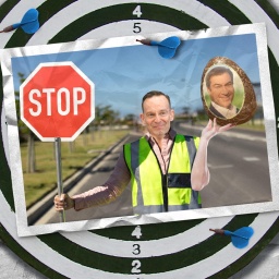Eine Fotomontage zeigt Verkehrsminister Volker Wissing, der in einer Hand ein Stopp-Schild hält und in der anderen ein übergroßes Schokoladenei, das mit dem Gesicht von Markus Söder verziert ist. 