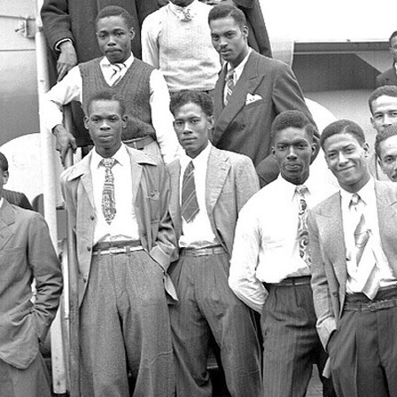 Some of the Jamaican men, mostly ex Royal Air Force servicemen, aboard the former troopship, S.S. Empire Windrush, before disembarking at Tilbury Docks, England, on June 22, 1948. They have come to Britain seeking employment. (AP Photo/Staff/Worth)