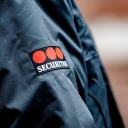 Jacke eines Wachmanns mit Securitas-Logo