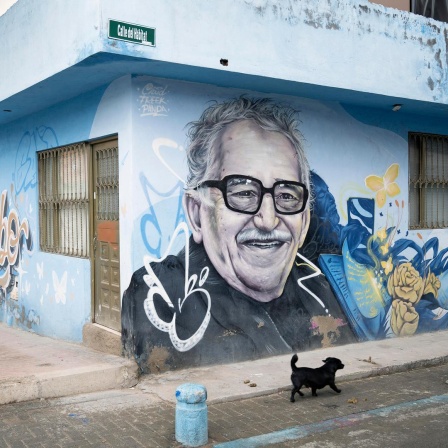 Ein Porträt des Schriftstellers  Gabriel García Márquez auf einer Wand in El Paraiso.