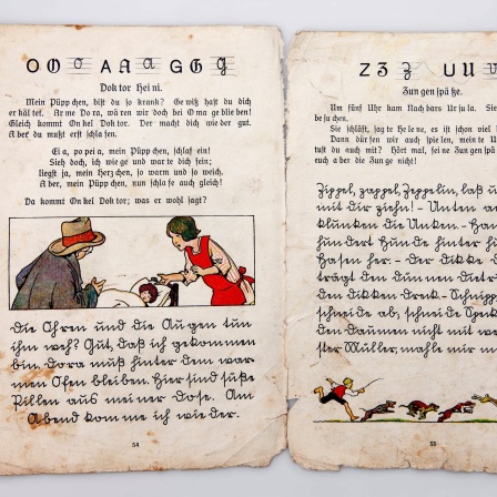 Altes Lesebuch in Sütterlin, Fraktur und lateinischer Schrift