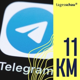 Das Logo der App Telegram ist auf dem Display eines IPhones zu sehen.