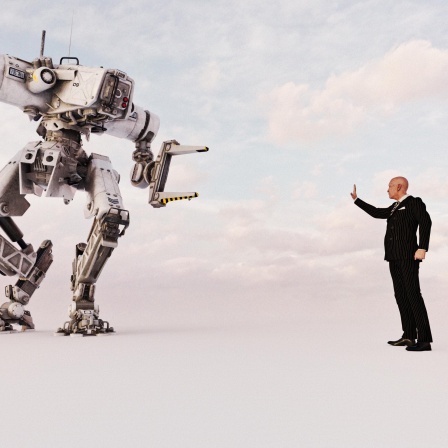 Ein Mann mit Anzug hält eine Hand hoch, um einen rieseigen Roboter zu stoppen.