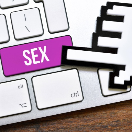 Fotomontage: Computertaste mit der Aufschrift Sex