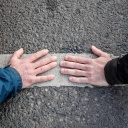 Letzte Generation Berlin, 24.04.2023 - Aktivisten der Letzen Generation haben ihre Hände auf einer Straße festgeklebt.