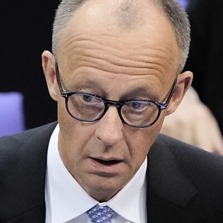Friedrich Merz reacts after he was not elected new Chancellor in the first voting process at the parliament Bundestag in Berlin, Tuesday, May 6, 2025.