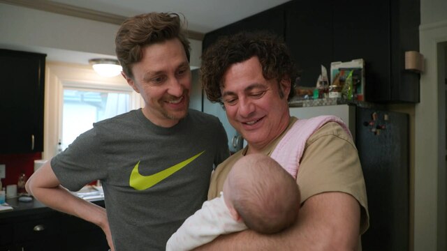 Johnny und Stefan mit ihrem Baby