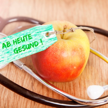 Apfel und Stetoskop