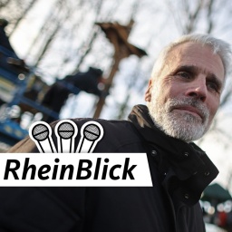 Der Aachener Polizeipräsident Dirk Weinspach vor einem Protestdorf in Lützerath