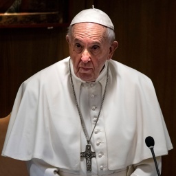 Pope Francis prays