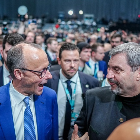 Friedrich Merz (l), Kanzlerkandidat der Union und CDU Bundesvorsitzender