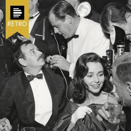 Eröffnung der Internationalen Filmfestspiele 1960. Jürgen Graf interviewt Bernhard Wicki. Im Vordergrund ist die Schauspielerin Susan Strasberg zu sehen.