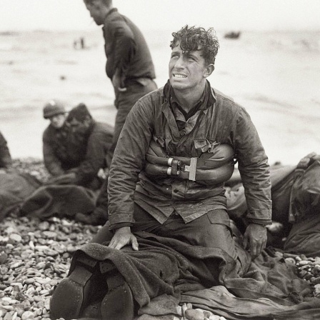Historische Aufnahme zeigt US-amerikanische Soldaten, die 1944 im 2. Weltkrieg, in der Normandy an Land gekommen sind, davon haben viele nicht überlebt.